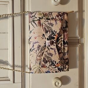 Betsy Johnson Crossbody Bag with snap Bow closure, partial gold link Strap